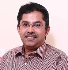 Dr Manoj C B